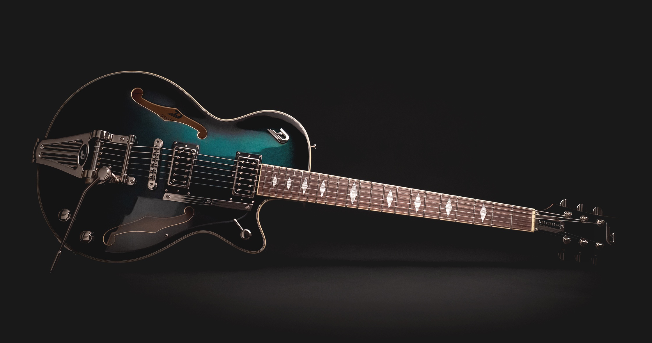 Duesenberg Starplayer TV Deluxe Catalina Green Burst on dark background
