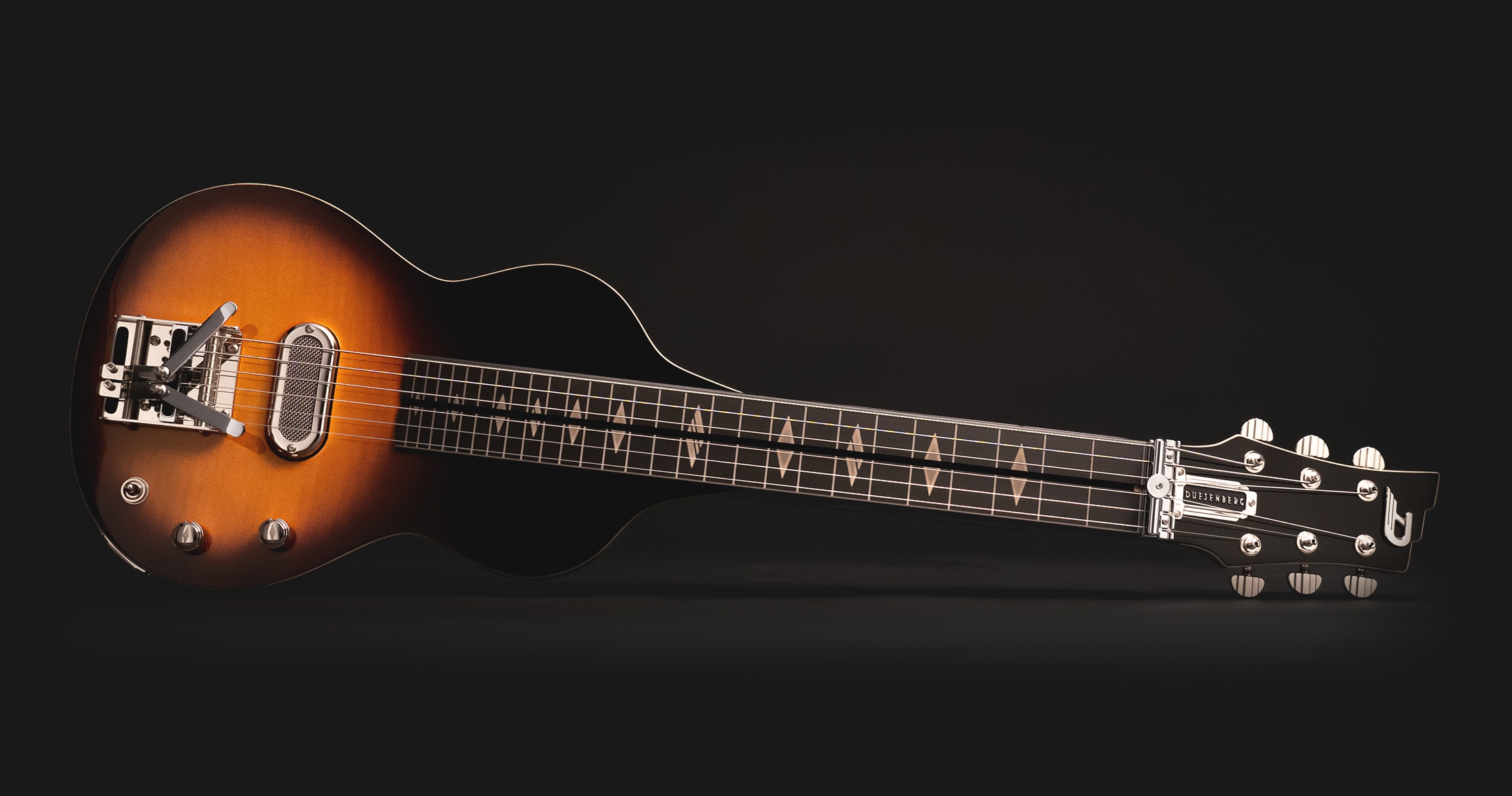 Duesenberg Kalico Lapsteel Tobacco Burst on dark background