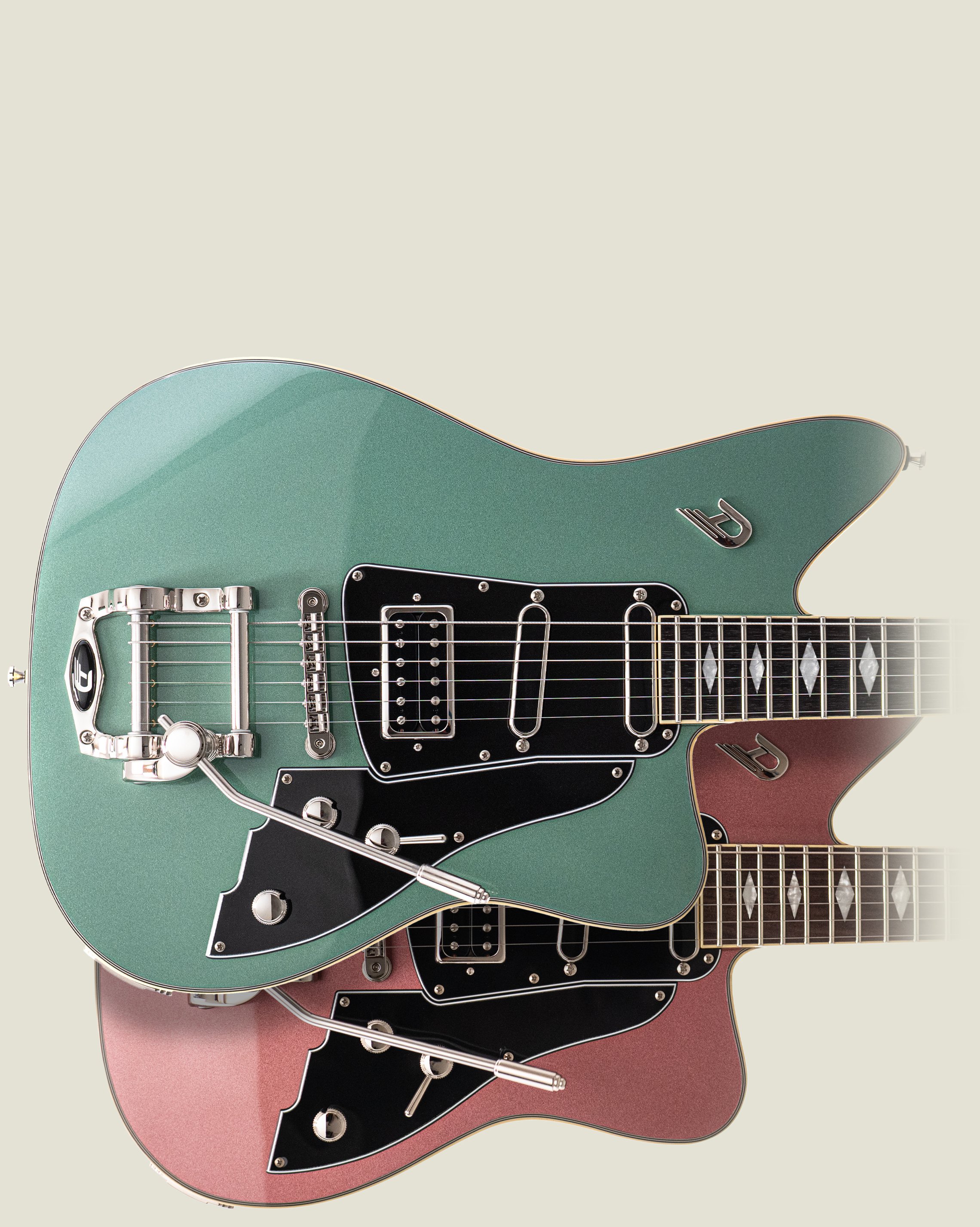 Image of the Duesenberg Paloma Series in Catalina Harbor Green and Catalina Sunset Rose on a light background